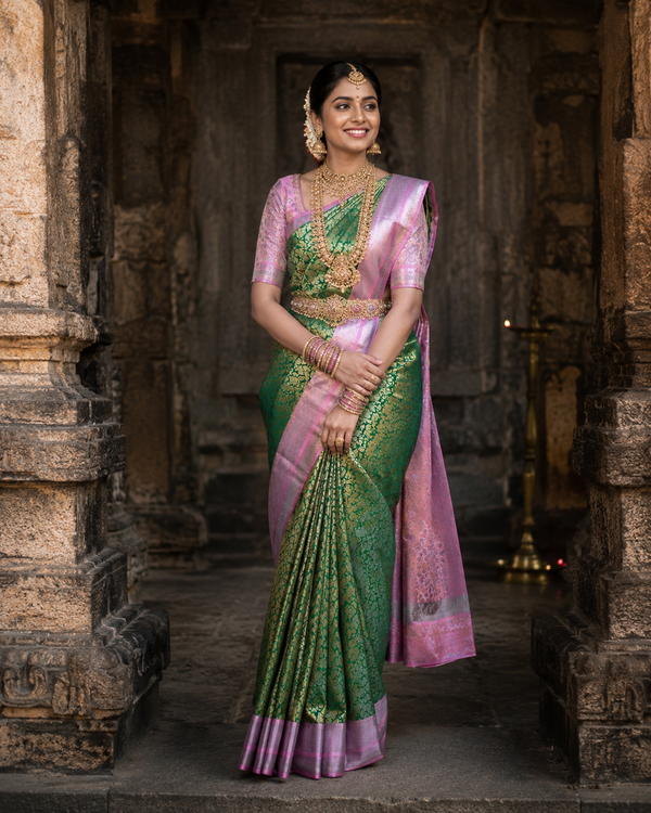 Bottle green Kanjivaram silk saree with lavender border and gold zari, draped on model — Bottle Green Kanjivaram Silk Saree, Vasthara Boutique