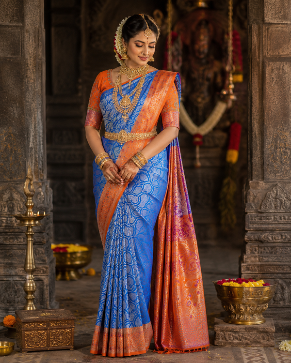 Cobalt blue Kanjivaram silk saree with orange border and gold zari, draped on model — Cobalt Blue Kanjivaram Silk Saree, Vasthara Boutique