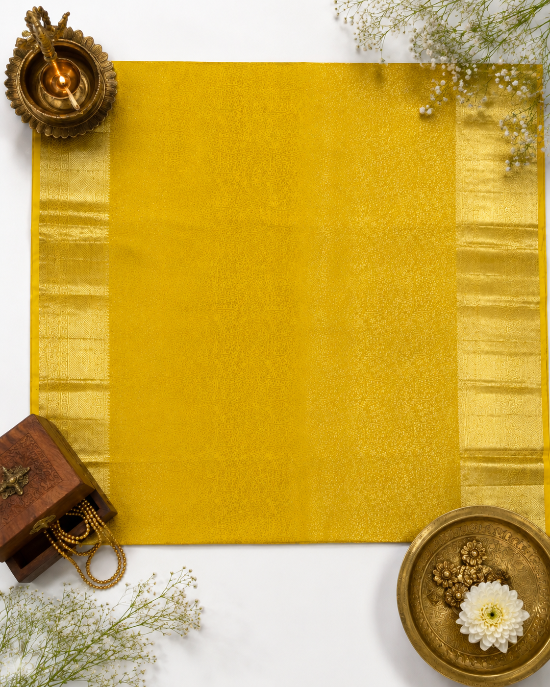 Gold textured saree with decorative elements on a white background
