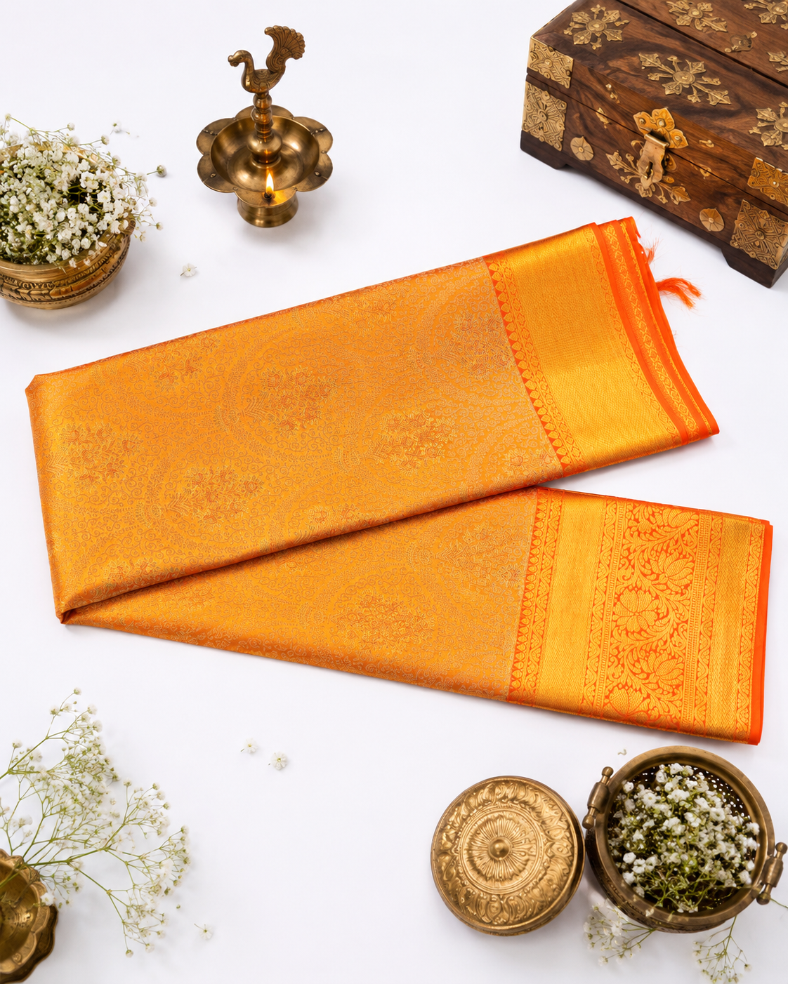 Sunset orange Kanjivaram pure silk saree with gold zari — close-up detail 2 — Vasthara Boutique